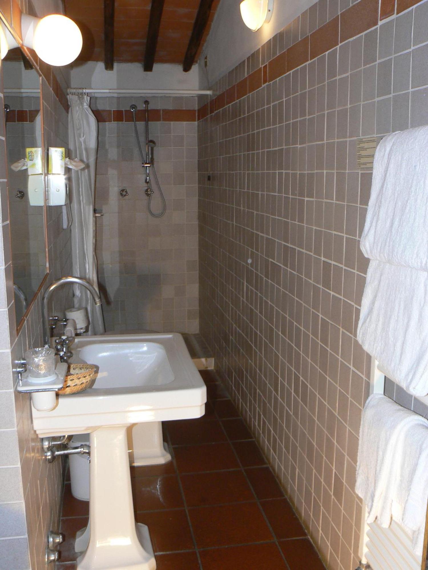 Hostal Relais Borgo Di Toiano Sovicille Habitación foto